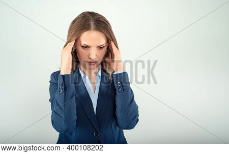 Young Business Lady With Far Away Loook Isolated On Grey Background