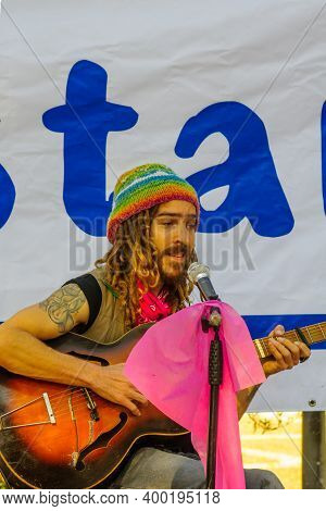 Haifa, Israel - December 18, 2020: Singer And Activist Itamar Beck Performs At A Pink Protest Event 