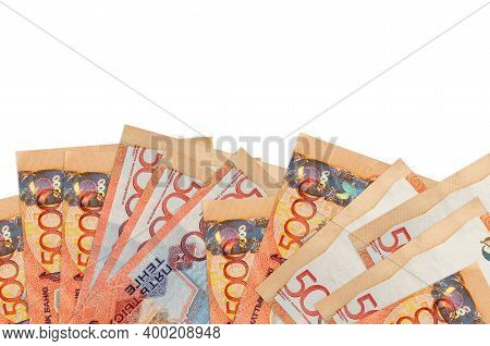 5000 Kazakhstani Tenge Bills Lies On Bottom Side Of Screen Isolated On White Background With Copy Sp