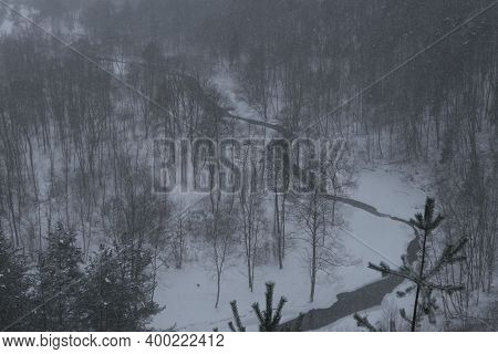 Aerial Panoramic Foggy View From The Top Of Puckoriai Mound In Winter In Lithuania. Snow Covered Gro