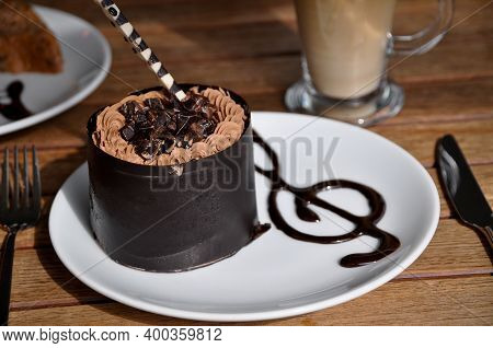 Prepared For Special Occasions, Delicious And Beautiful Chocolate Small Cake, In A White Plate