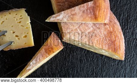 Group Of Natural Mountain Cheeses Made In The Traditional Craft Cheese From Cows And Goats Milk.