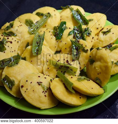 Dhokla Khaman Home Made With Coriander Garnishing On Plate, Fresh And Hot Yellowish Khaman Dhokla Wi