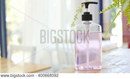 Soap Dispenser And Spa Towel ,roll Up Of White Towels On White Table With Copy Space,towels Studio S
