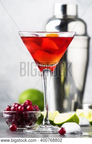 Cosmopolitan Cocktail With Vodka, Liqueur, Cranberry Juice, Lime, Ice And Orange Zest, Gray Bar Coun