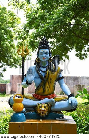 Statue Of Lord Shiva And Background Raining