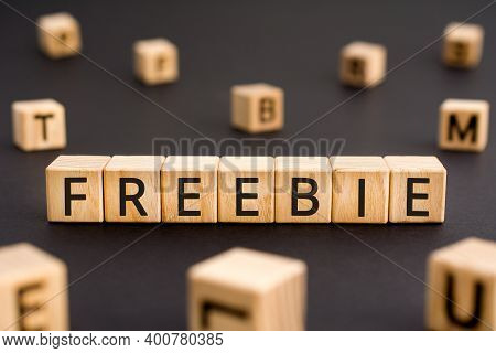 Freebie - Word From Wooden Blocks With Letters, Given Free Freebie Concept, Random Letters Around Wh