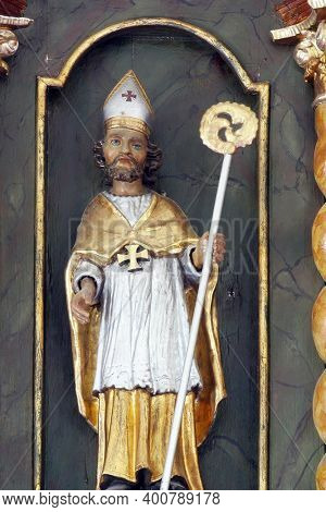 SVETI PETAR MREZNICKI, CROATIA - JULY 14, 2013: St. Blaise, statue on the high altar at St. Peter's Parish Church in Sveti Petar Mreznicki, Croatia