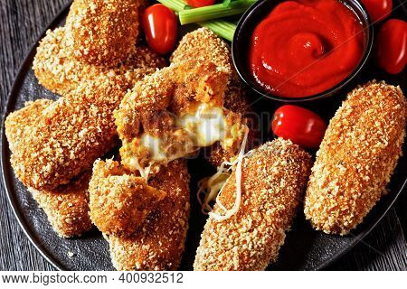 Suppli Al Telefono Italian Fast Food - Fried Rice Croquettes Stuffed With Mozzarella Served On A Bla