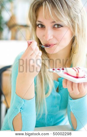 Woman Eating Cake