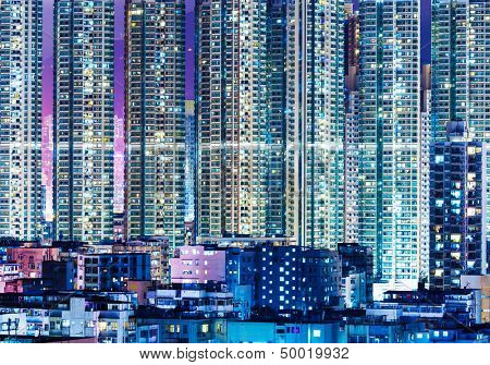 Overpopulated modern building in Hong Kong at night