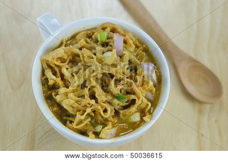 Yellow Noodles On Wooden Background