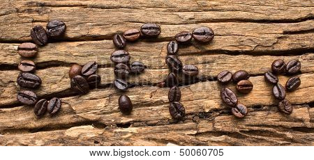 Coffee Beans In A Letter On The Scene.