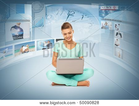 technology, internet, tv and news concept - young woman with laptop pc and virtual screens