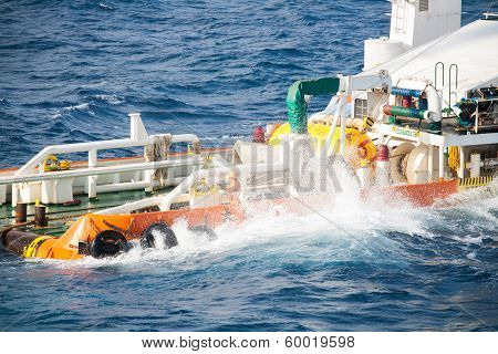 boatman working on deck supply boat, crews operation on installation boat, heavy job in offshore