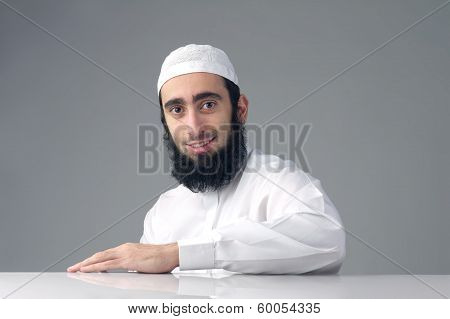 Arabic Muslim man with beard smiling
