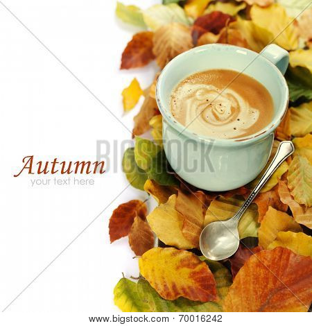 cozy cup of coffee and autumn leaves over white (with easy removable sample text)