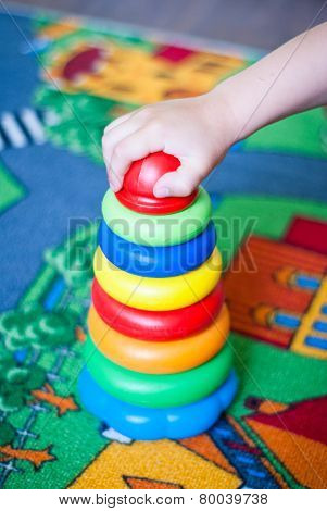 Child Adds A Pyramid