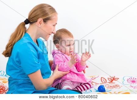 Adorable Baby With Babysitter