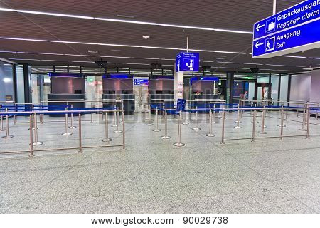 Officer Is Waiting At Passport Control Counter For Arriving Passengers At Night