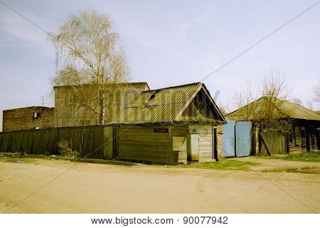 The empty ruined church behind the fence in outback