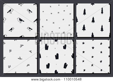 Vector set of hand drawn christmas, winter seamless patterns.