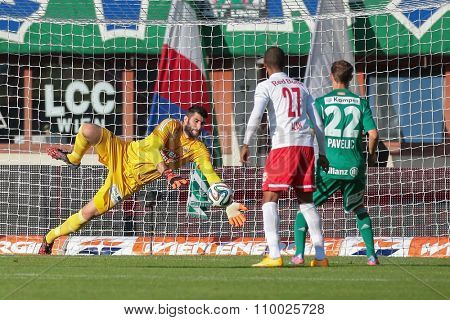 VIENNA, AUSTRIA - SEPTEMBER 28, 2014: Jan Novota (#1 Rapid) catches the ball in an Austrian soccer league game.
