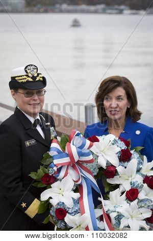 NEW YORK - NOV 25 2015: Rear Admiral Cynthia M. Thebaud, Commander, Expeditionary Strike Group 2 and Kathleen Hochul, Lt Governor of New York at the ceremony on the Intrepid Museum on Veterans Day.