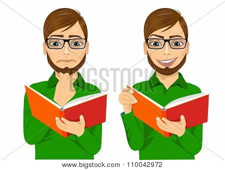 man focused reading interesting book