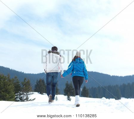 portrait of happy young romantic tourist  couple outdoor in nature at winter vacation
