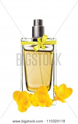 Women's Perfume In Beautiful Bottle And Freesia Flower Isolated On White