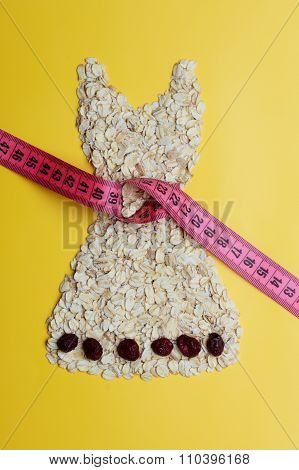 Dress Shape Made From Oatmeal With Measuring Tape