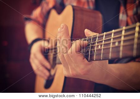 Guitarist Playing On Guitar