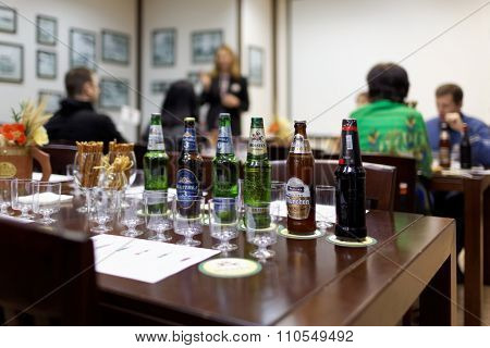 ST. PETERSBURG, RUSSIA - OCTOBER 24, 2015: Tourists during tasting session at the Baltika - St Petersburg brewery. This session is a part of the October Beer Festival celebrations