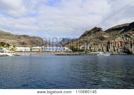 PUERTO DE MOGAN - NOVEMBER 27: View of the Atlantic ocean beach on 27 November 2015 in Puerto de Mogan, Gran Canaria Island.