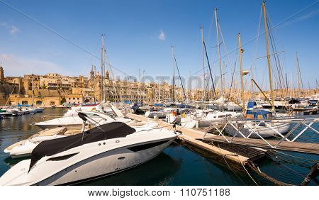 yachts in Valleta port on the background of the city in Malta