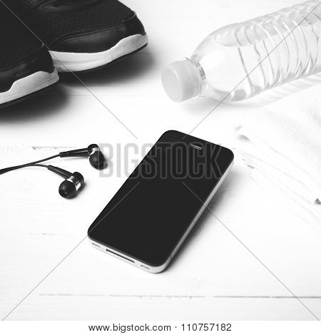 fitness eqiupment:running shoes water bottle towel smart phone black and white color style