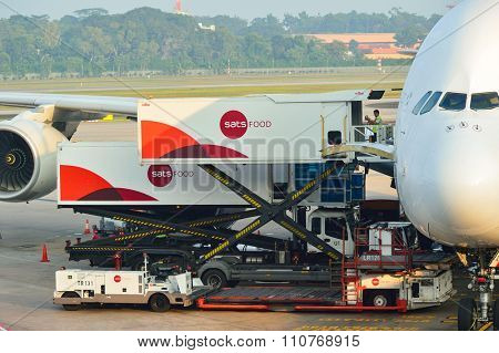 SINGAPORE - NOVEMBER 10, 2015: A380 docked at Changi Airport. Singapore Changi Airport, is the primary civilian airport for Singapore, and one of the largest transportation hubs in Southeast Asia