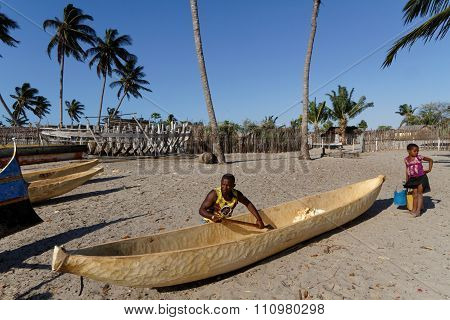 Belo, Madagascar, November 24, 2015 : Building Of A Traditional Pirogue On The Beach. The Outrigger