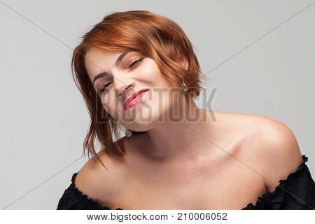 Contempt for life. Overconfident woman. Contemptuous attitude for partner, self-confident young female on grey background closeup