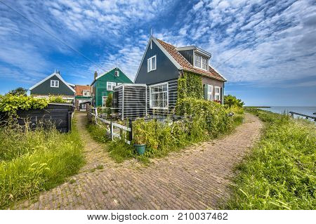 Beatiful Street In Typical Fishing Village Of Rozewerf Scene On Marken Island With Icebreakers