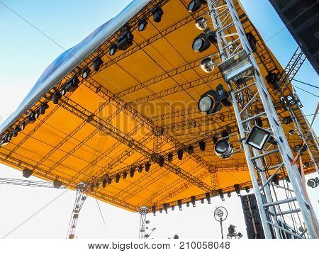 Street scene of a rock music festival in the open air. Open air.
