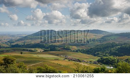Landscape of Beaujolais with a cloudy sky