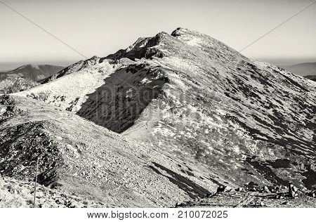 Footpath leading up the peak Dumbier Low Tatras Slovak republic. Hiking theme. Mountains scene. Black and white photo.