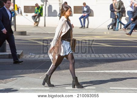 London, UK - March 15, 2017: Walking people in the City of London, Bank street.