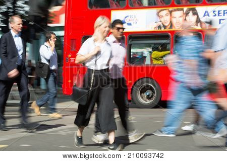 LONDON, UK - June 9, 2017: Blurred image of walking people at Oxford street, the main destination for shopping at Westend.