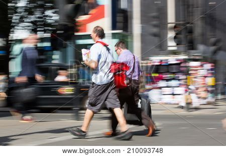 LONDON, UK - June 9, 2017: Blurred image of walking people at Oxford street, the main destination for shopping at Westend.