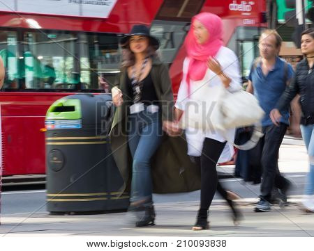 LONDON, UK - June 9, 2017: Blurred image of walking people at Oxford street, the main destination for shopping at Westend.