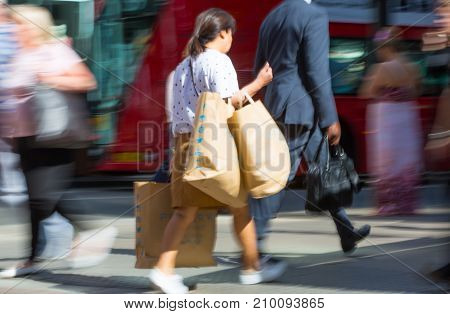 LONDON, UK - June 9, 2017: Blurred image of walking people at Oxford street, the main destination for shopping at Westend.