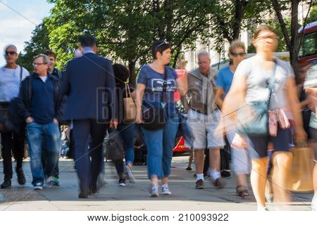 LONDON, UK - June 9, 2017: Blurred image group of walking people at Oxford street, the main destination for shopping at Westend.